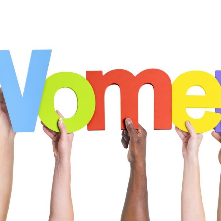 Diverse Hands Holding The Word Women