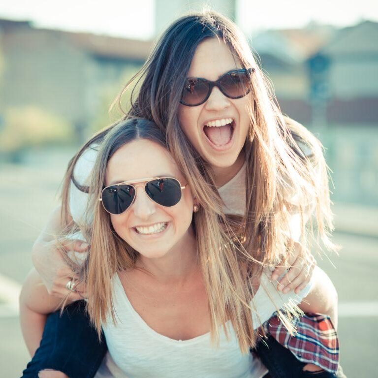 two beautiful young women having fun